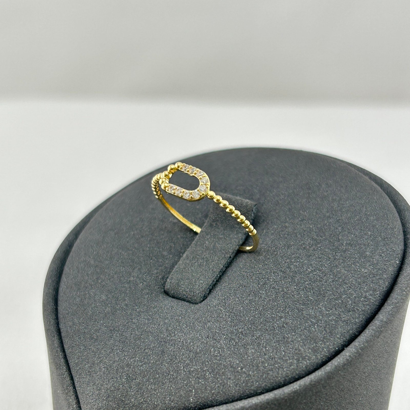 IMG_2007 خاتم ذهب عيار 18 بتصميم حبة ذهب مرصعة بزركون من جولدانا