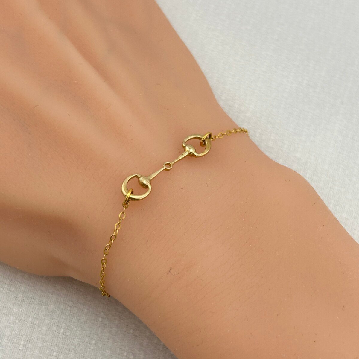 IMG_2989 سوار ذهب عيار 18 بحلقات متقابلة كلاسيكية من جولدانا